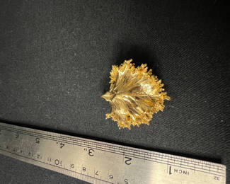 Lot 120: Gold-toned leaf-shaped pendants