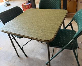 folding card table with four chairs