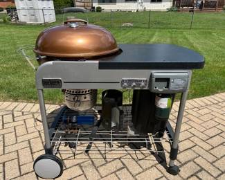 Weber Charcoal Performer grill with propane lighter, grilling tools included,  $295