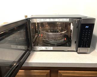 BUY IT NOW! $125.00. GE countertop convection microwave. Call Jan at 314 960-5700