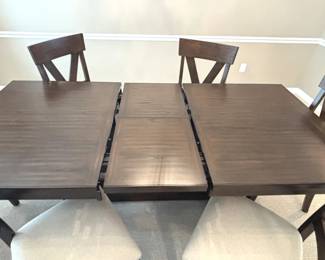 BUY IT NOW! $750.00. Dining table w/six upholstered chairs. 42" W x 68" L x 30" H. (86" L with leaf). Call Jan at 314 960-5700