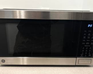 BUY IT NOW! $125.00. GE countertop convection microwave. Call Jan at 314 960-5700