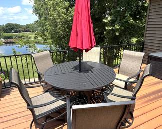 BUY IT NOW! $475.00. Patio table & six swivel/rocker chairs. 54" dia. table w/umbrella & base. Call Jan at 314 960-5700
