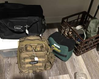 Magreel fishing back pack, box of clay pigeons.