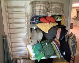 Decorator pillows and shoe rack.