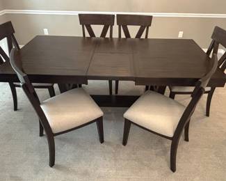 BUY IT NOW! $750.00. Dining table w/six upholstered chairs. 42" W x 68" L x 30" H. (86" L with leaf). Call Jan at 314 960-5700