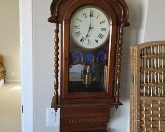 antique German Vienna Regulator style wall clock, manufactured around the late 1890s to 1910s.
