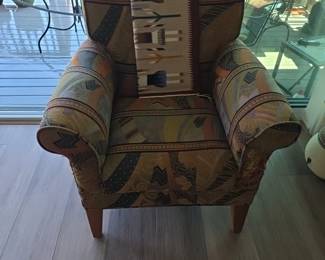 vintage Broyhill upholstered lounge chair does have damage in the photo on the right side