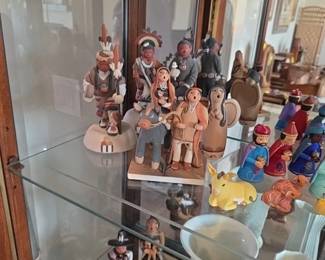 Native American Pueblo pottery storyteller figurines