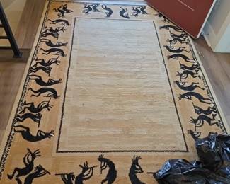 contemporary Kokopelli-themed Southwestern accent rug, two available