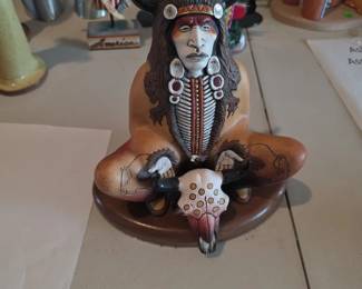 This item is a limited-edition multi-media sculpture titled "Screaming Bull" by the recognized artist Kathryn Yauney