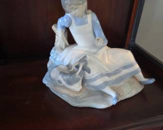 vintage Nao by Lladró porcelain figurine titled "Cecilia and Her Goat" (Model #971), handcrafted in Valencia, Spain, during the late 20th century.