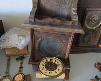 American gingerbread or kitchen shelf clock case from the 1880s to 1900s, which has been completely disassembled into a "project" state.