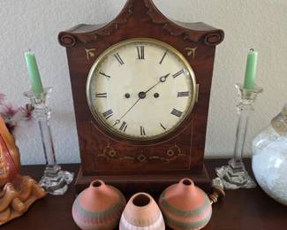 English bracket or mantel clock, constructed in the Lancet or Bracket style during the mid-to-late 19th century (Victorian era).