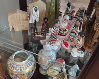 Native American Pueblo pottery storyteller figurines