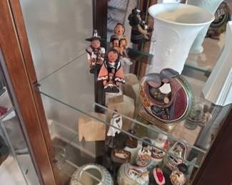 Native American Pueblo pottery storyteller figurines