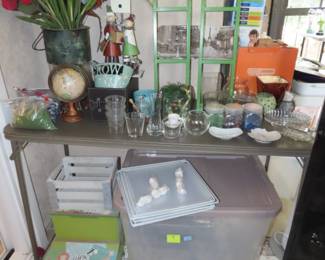 Shells, glass, vases, pots, silk flowers, large plastic storage totes.