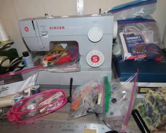 Singer sewing machine and sewing notions.