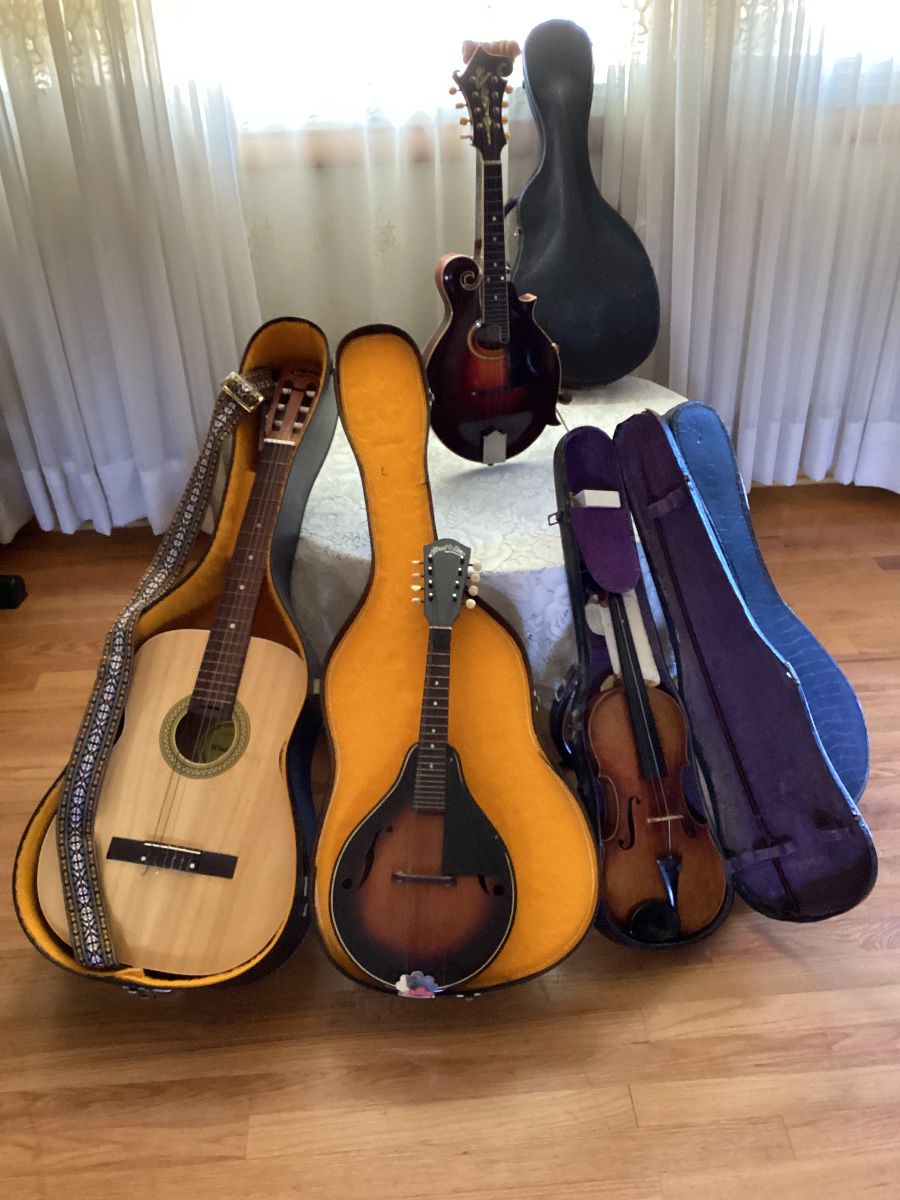 Gibson F4 mandolin, Strat-o-Lin mandolin, Guitar, and Violin.