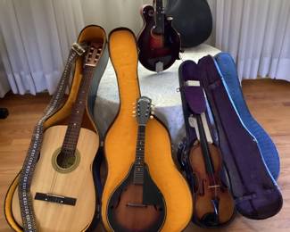 Gibson F4 mandolin, Strat-o-Lin mandolin, Guitar, and Violin.