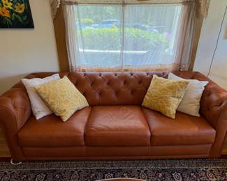 Leather tufted couch-bought new in 2021 at the Inkwell in Corvallis for $2400, selling for $1500. Has a matching Chair-will bundle.
