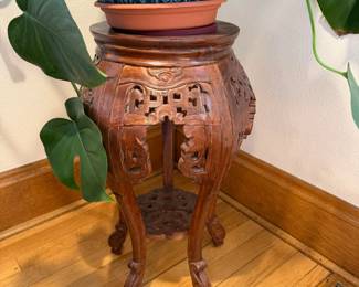 Carved wood plant stand. $100.