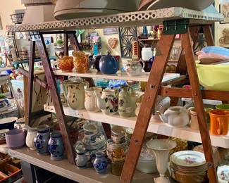 Pitchers tea pots,  cream and sugars
