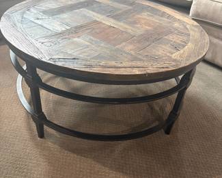 Large Round Coffee Table. Will sell ahead of sale.