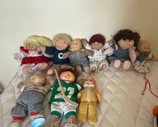 Collection of Vintage Cabbage Patch Kids Dolls with Sports Attire