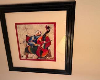 The framed artwork appears to be a limited edition print titled "Red Cello" by artist Alexander Sanal
