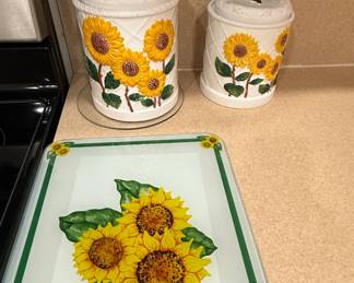 Sunflower Ceramic Canister Set and Glass Cutting Board by Susan Winget