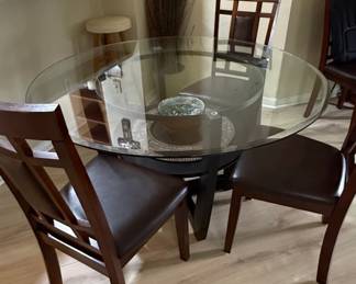 Ashley Furniture Charrell Round Glass Top Dining Set