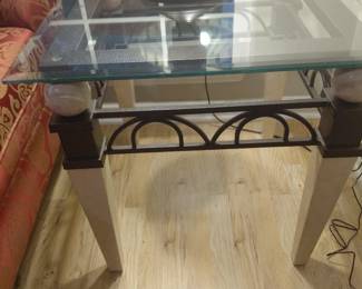 Two glass and tables metal frame with glass top