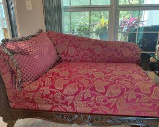 Beautiful chaise lounger with attached pillow, shown in beautifully handcrafted wood base and arm pressed back rested