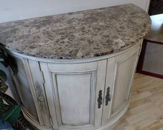 Two door solid bar with granite top.Heavy piece
