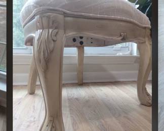 A very wide solid chairs with bolts holding the crossbeams.Also very fine detailed
