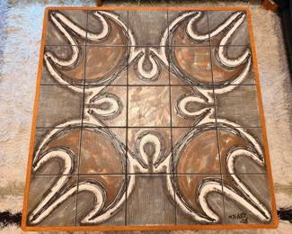 Mid Century teak coffee table signed “Ox-Art ‘78” by Trioh, Denmark.  This table features one of a kind hand crafted ceramic tiles 