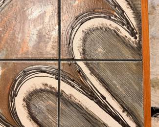 Mid Century teak coffee table signed “Ox-Art ‘78” by Trioh, Denmark.  This table features one of a kind hand crafted ceramic tiles 
