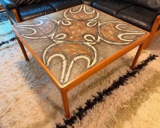 Mid Century teak coffee table signed “Ox-Art ‘78” by Trioh, Denmark.  This table features one of a kind hand crafted ceramic tiles 