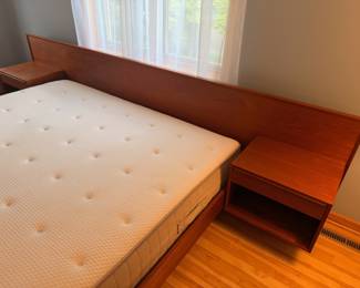 Incredible vintage Danish Modern teak King Size floating bed frame by Westnofa. This piece measures 124” W x 83”D and is overall excellent vintage condition. King mattress is included
