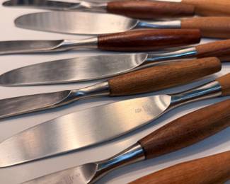 Incredible 50 piece set of vintage Dansk IHQ Fjord teak and stainless steel flatware set designed by Jens Quistgaard