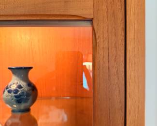 Ca. Late 60’s/early 70’s teak display cabinet by D-Scan. This two-piece cabinet is in excellent vintage condition and measures 61”W x 77”T x 20”D