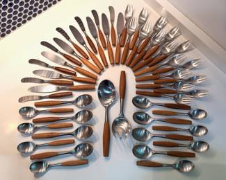 Incredible 50 piece set of vintage Dansk IHQ Fjord teak and stainless steel flatware set designed by Jens Quistgaard