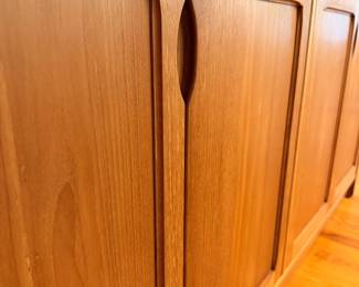 Ca. Late 60’s/early 70’s teak display cabinet by D-Scan. This two-piece cabinet is in excellent vintage condition and measures 61”W x 77”T x 20”D