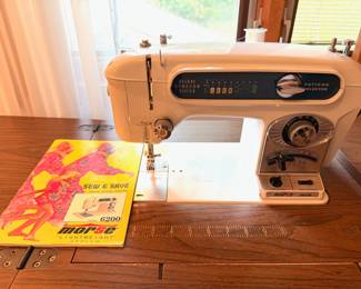 Vintage Morse “Lightweight” Apollo sewing machine Model 6200 with original carrying case, accessories, sewing cabinet and sewing chair. This will all be sold together