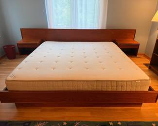 Incredible vintage Danish Modern teak King Size floating bed frame by Westnofa. This piece measures 124” W x 83”D and is overall excellent vintage condition. King mattress is included