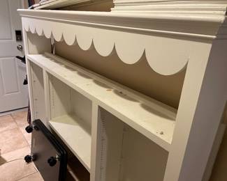 White shelving Unit with hand carved scallops