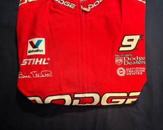 This vintage Chase Authentics Bill Elliott #9 Dodge racing jacket features a bright red cotton shell with embroidered sponsor logos like Valvoline, Stihl, and Dodge Dealers.