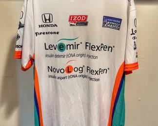 This is a vintage Chip Ganassi Racing team jersey featuring Novo Nordisk diabetes product sponsorships associated with driver Charlie Kimball (#83).