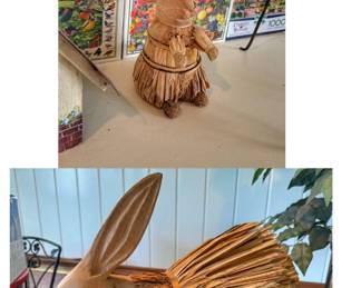 These two vintage rustic folk art figurines are handmade primitive corn husk and carved wood bunny rabbit decor pieces featuring a natural palm fiber body and a solid carved wooden head.